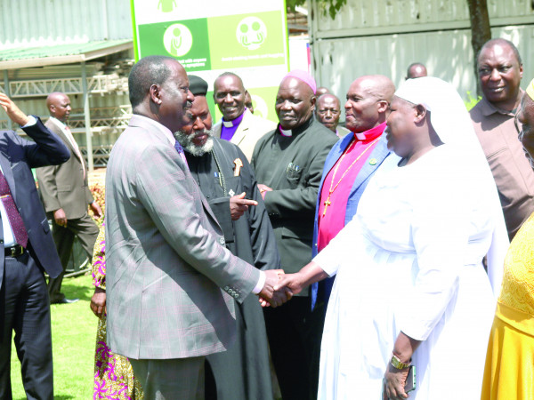 Azimio presidential flag bearer Raila Odinga (left) meets religious leaders drawn from independent churches in Nairobi yesterday. PHOTO/GERALD ITHANA