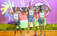 Pondium finish trio in men’s 10000m of, from left, David Kipkogei, Simon Kibai and Peter Toroitich pose after bagging bronze, gold and silver respective at the Deaflympics Summer Games in Caxias Do Sul, Brazil yesterday. PHOTO/SPORTPICHA