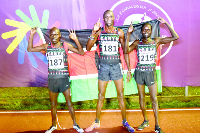 Pondium finish trio in men’s 10000m of, from left, David Kipkogei, Simon Kibai and Peter Toroitich pose after bagging bronze, gold and silver respective at the Deaflympics Summer Games in Caxias Do Sul, Brazil yesterday. PHOTO/SPORTPICHA