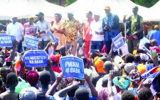 Azimio flagbearer Raila Odinga addresses his supporters in Kilifi county, yesterday. PHOTO/Ndegwa Gathungu