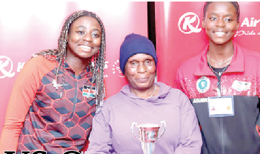 Teen tennis star Angela Okutoyi (left) with her grandmother Mary Ndonda (centre) and her twin sister Rosehilda Asumwa at the JKIA upon her arrival from London. PHOTO/Rodgers Ndegwa.