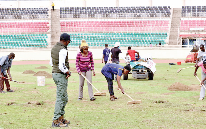 Sports Cabinet Secretary Ababu Namwamba inspects the works at Nyayo Stadium yesterday. He urged the contractors to work round the clock to ensure the facility is ready before August 18. PHOTO/ David Ndolo