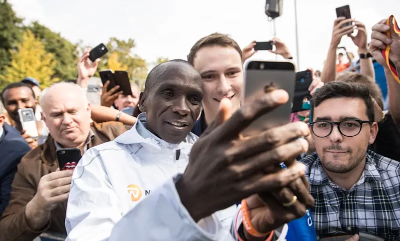 Eliud Kipchoge poses with fans in Berlin. PHOTO/Reuters
