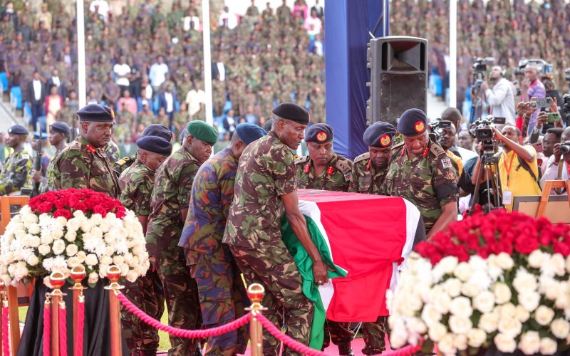 Members of the Kenya Defence Forces carry the casket bearing the body of CDF General Ogolla at Ulinzi Sports Complex in Lang'ata. PHOTO/(@HonAdenDuale)/X